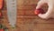 Woman hands cutting strawberries on wooden cutting board