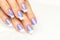 Woman hands with french manicure close-up