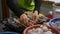 Woman Hands Grill Chicken and Pork Kebabs on Wooden Sticks on an Electric Grill