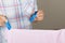 Woman Hands Hanging Wet Clean Cloth To Dry On Clothes Line At La