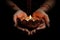 Woman hands with henna holding colorful clay diya lamps lit during diwali celebration