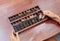 Woman hands holding Chinese ABACUS old antique calculator retro finance education, tool work business accounting