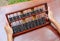 Woman hands holding Chinese ABACUS old antique calculator retro finance education, tool work business accounting