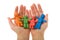 Woman hands holding colorful clay people family