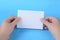 Woman hands holding empty note paper