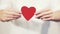 Woman hands holding Heart shape Love symbol