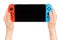 Woman hands holding Nintendo Switch console