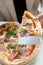 Woman hands holding slice of neapolitan pizza