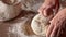 Woman hands kneading the bread dough