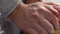 Woman hands kneading dough on table closeup