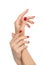 Woman hands with manicured red nails