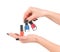 Woman hands with nail polishes