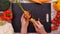 Woman hands peel fresh carrot - slow motion