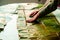 Woman hands preparing banana leaves for hallaca a venezuelan christmas dish