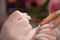 Woman hands receiving a manicure