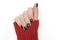 woman hands in red sweater with fresh polished nails and red winter Christmas New Year manicure