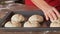 Woman hands shaping the dough making buns