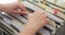 Woman hands sort folders in paper drawer