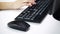 Woman hands typing on computer keyboard at office