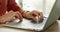 Woman, hands and typing on laptop for working, social media and proposal doing research online. Female student, keyboard