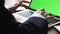 Woman hands typing mockup laptop in office closeup. Unknown lady pushing buttons on chromakey computer keyboard at