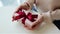 Woman hands unwrapping the gift close up