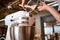 Woman hands whipping with mixer. Making dessert in modern kitchen