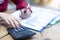 Woman hands working with calculator about personal financial