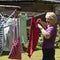 Woman hanging washing out to dry