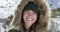 Woman, happy and snowy mountain with face, thinking and peak with fur, cold and eyes. Hiker, vision and climber for