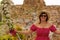 Woman in a hat on the terrace in cappadocia, turkey