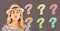 Woman with hat thinking with colorful funky question marks