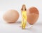 Woman hatching from egg