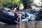 Woman have happiness and enjoying the creek in nature lifestyle