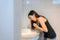 Woman have a morning sickness,Pregnant female nausea in toilet