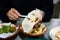 Woman having Arabic food in a restaurant