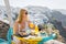 Woman having breakfast in luxury hotel in Santorini