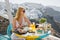 Woman having breakfast in luxury Mediterranean resort
