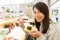 Woman having Conveyor belt sushi