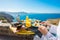 Woman having delicious breakfast in Mediterranean summer