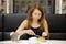 Woman having dessert in a cafe