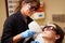 Woman Having Laser Treatment At Beauty Clinic