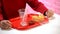 Woman having lunch in fast food restaurant, french fries and empty glass on tray