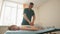 Woman having an osteopath treatment - the doctor massaging her spine