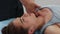 Woman having an osteopathic treatment - massagist massaging her hand
