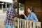 Woman having unpleasant talk with neighbour