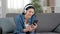 Woman having a video call on phone at home