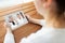 Woman having video chat with pharmacist on tablet