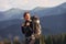 Woman having a walk. Majestic Carpathian Mountains. Beautiful landscape of untouched nature