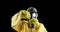 Woman in Hazmat with beaker and test tube
